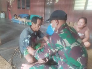 Satgas Yonif 144/JY Sosialisasikan Prokes dan Pengobatan Gratis di Batas Negeri