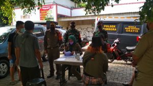 OPS Yustisi Babinsa Koramil 02/TB Bersama Tiga Pilar Jaring 15 Pelanggar Prokes di Jalan Kopi Roamalaka