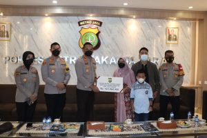 PT Asabri Bersama Polres Metro Jakarta Barat Berikan Santunan Jaminan Kecelakaan Kerja Kepada Keluarga Almarhum Ipda Zainuri