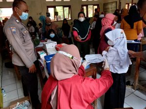 Polsek Tambelang Vaksinasi Presisi Serentak Untuk Anak Usia 6-12 Tahun