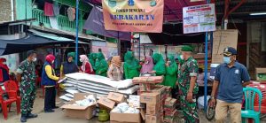 Ketua Persit KCK Cabang XIX Kodim 0505/JT Berikan Bantuan Korban Kebakaran
