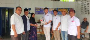 Banjir Rendam Beberapa Desa di Kecamatan Tanjung Pura dan Besitang, DPD Perindo Langkat Beri Bantuan Beras