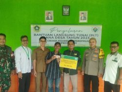 Pastikan Berjalan dengan Aman,Babinsa Serda Kusnadi Monitoring Giat Penyaluran BLT di Desa Cibunar