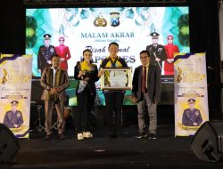 AKBP Dr. Erik Raih Penghargaan Nasional dari Puskat Nus di malam Pisah Kenal Kapolres Magetan